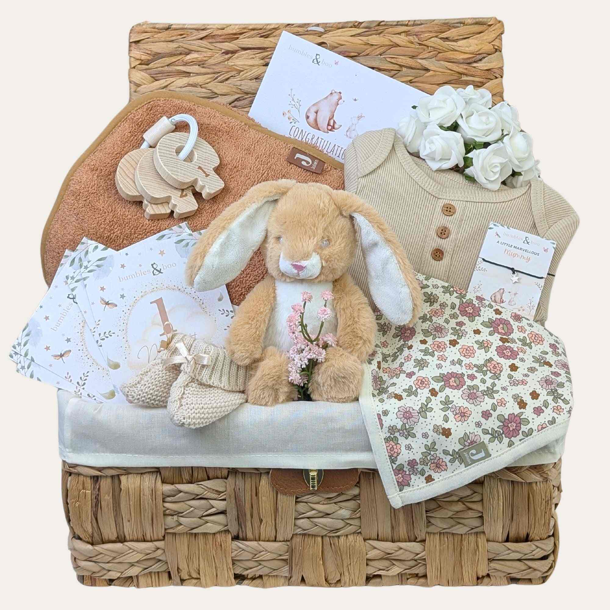 Baby girl gifts hamper basket with a bunny and beige theme. Presents by bumbles and boo.