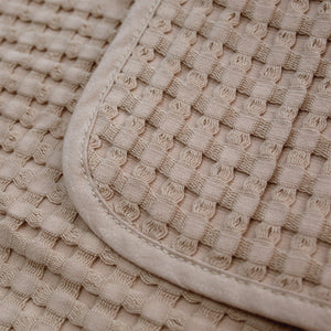 Newborn waffle baby blanket in neutral sand – soft and snuggly – Bumbles and Boo