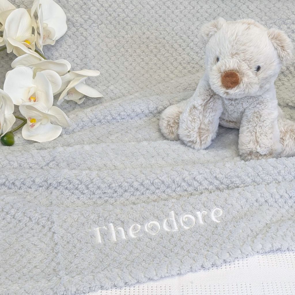 Soft Grey fluffy waffle baby blanket that has been personalised with name. Suitable from birth.