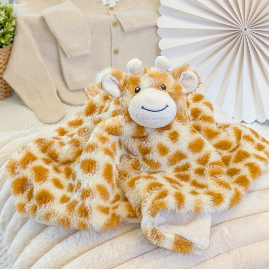 Plush huggy giraffe baby comforter toy suitable from birth.