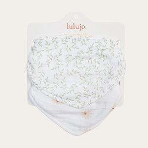 White baby bib with green leaf pattern and 'lulujo' branding on a white background