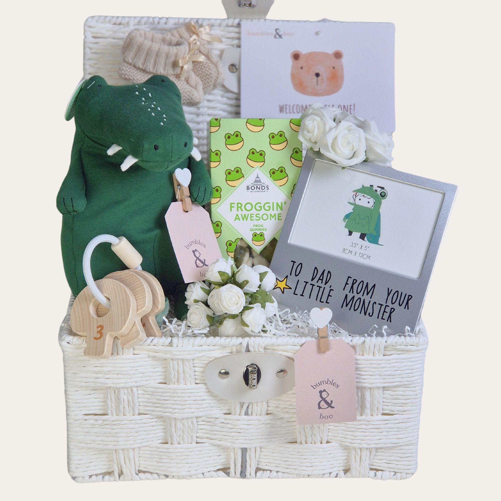 New Dad Gifts Hamper full of green themed presents for a New Dad and Baby. Perfect for celebrating a new arrival or a Father's Day gift.