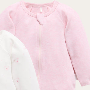 Pink and white zip-up baby suits for girls