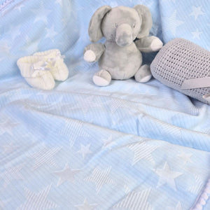 Blue star embossed mink baby blanket with Pom Pom trim. 75 x 90cm
