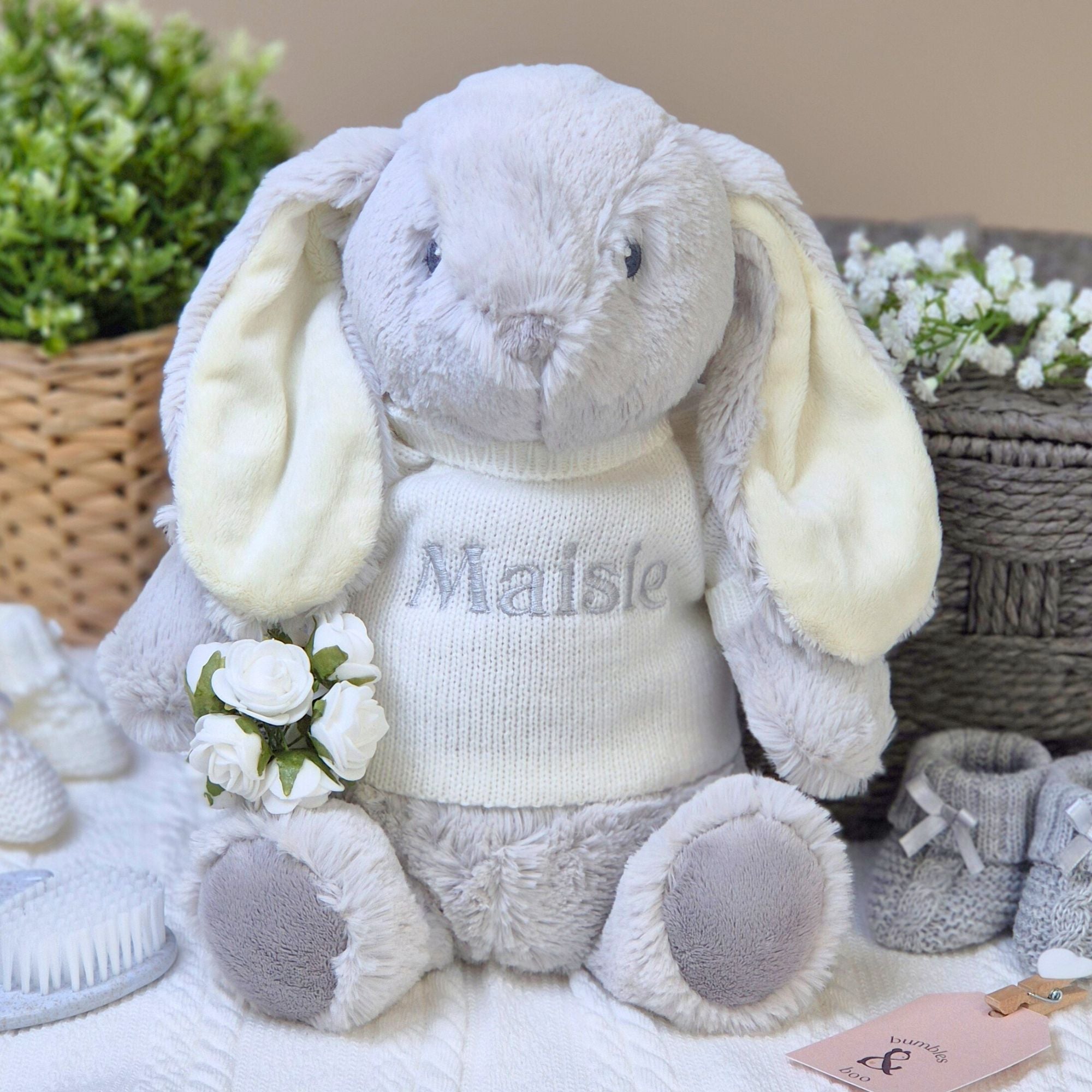 Grey Soft Bunny Plush Toy with Cream Jumper that has been personalised in Grey embroidery with baby name. Perfect new baby gift.