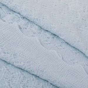 Luxury blue baby shawl, handcrafted from soft 100% acrylic with a delicate lace design, perfect for newborns and baby gifts.