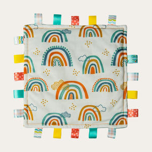 Taggies original baby comforter with tags in rainbow print.