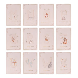 Alphabet cards M to X displayed in rows, showing animals from meerkat to xenops.