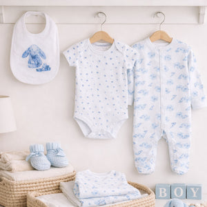 A blue and white baby clothing set with a bunny theme in soft cotton