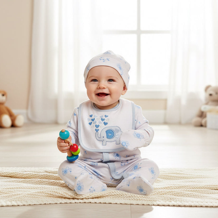 A six piece clothing set with an elephant theme for baby boy in blue and white