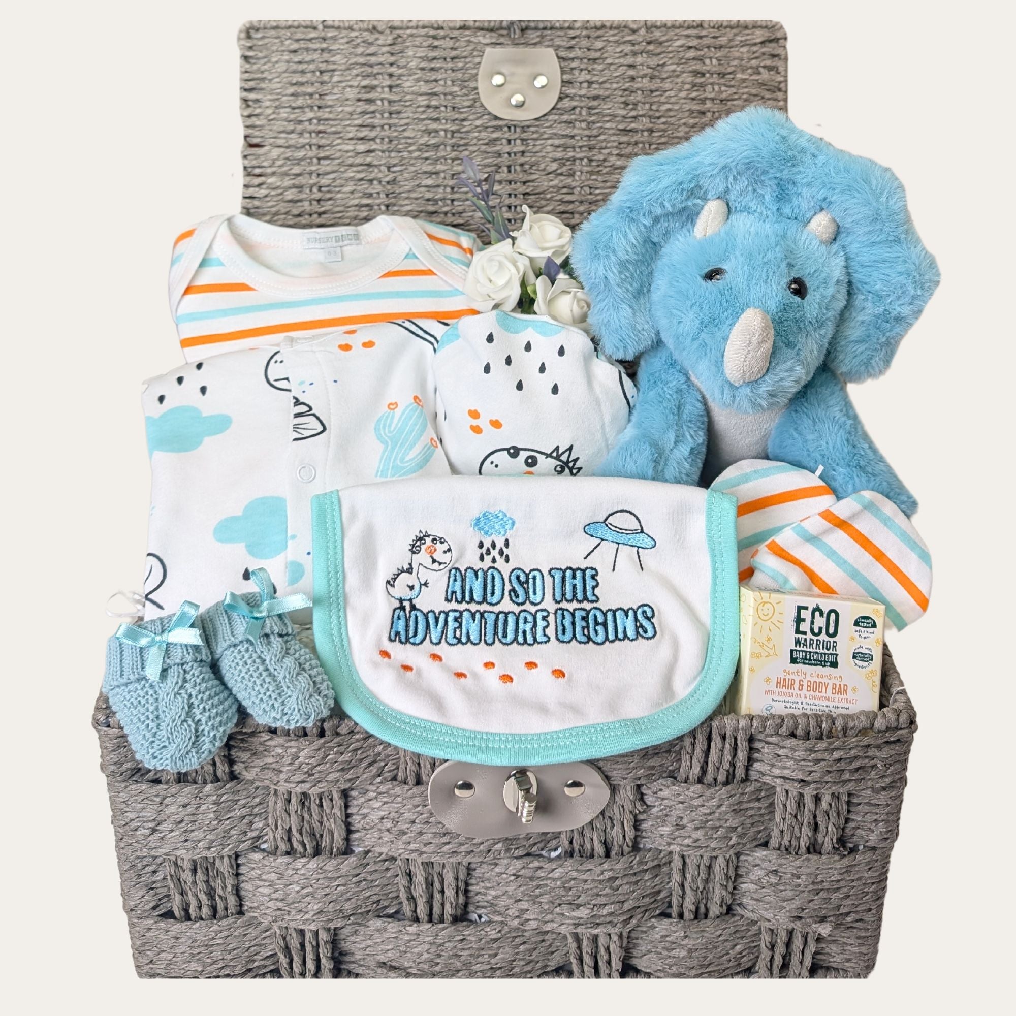 New baby boy gifts hamper basket with dinosaur themed clothes set and soft toy. Bumbles and Boo.