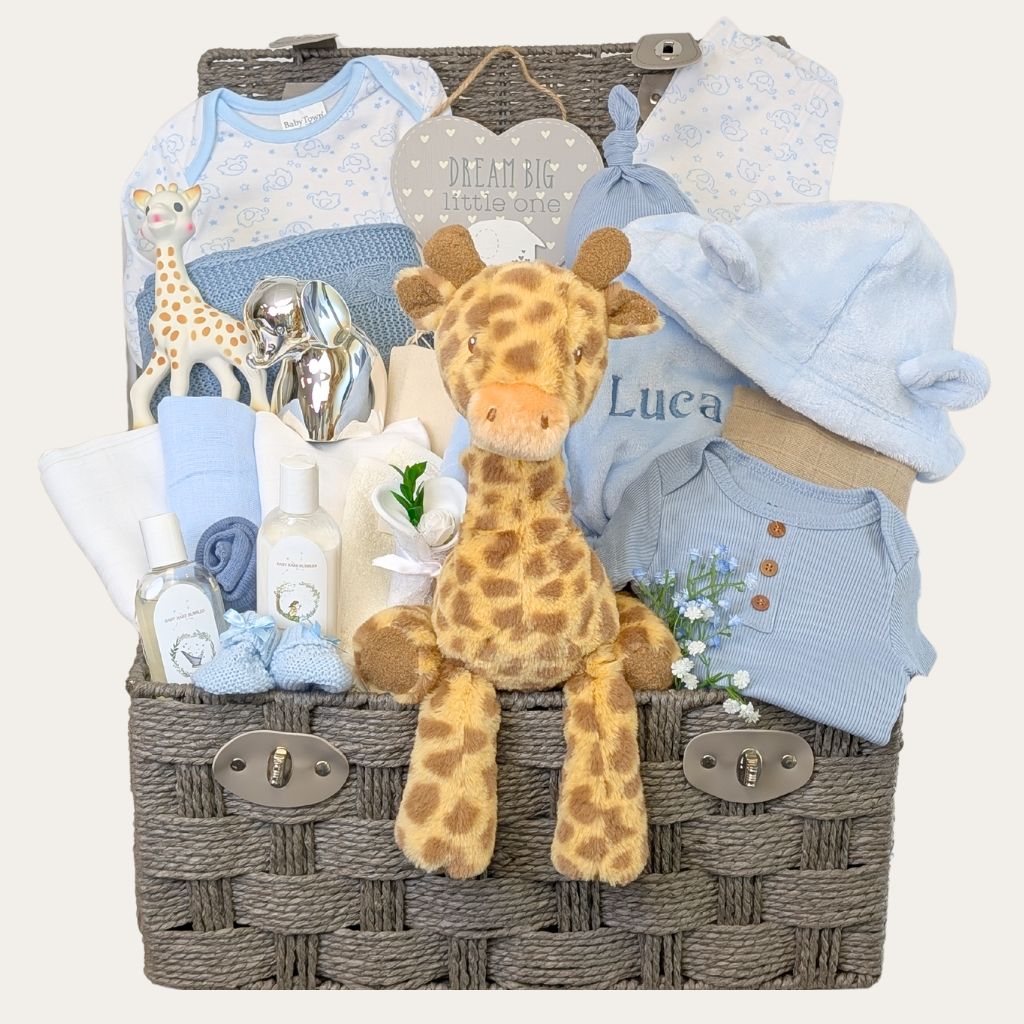 Large Luxury Baby Boy Gifts Hamper Basket packed with giraffe presents. Designed by Bumbles and Boo.