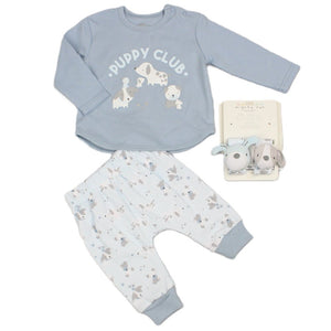 Full blue puppy baby outfit on white, showing shoulder poppers, cuffed trousers and two packaged wrist rattles.