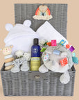 new baby hamper with blanket, bath robe, hedgehog and organic baby skincare.