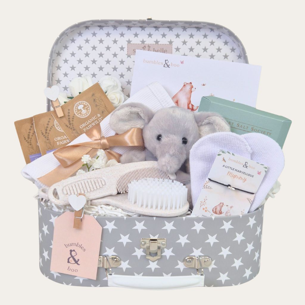 Gift hamper for a new baby containing grey presents and elephant soft toy. Bumbles and Boo.