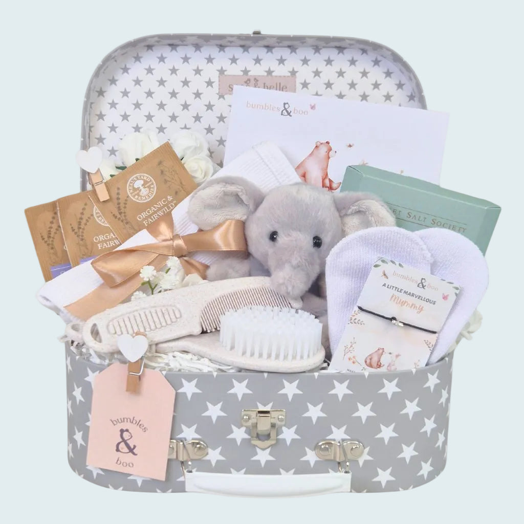 Gift hamper for a new baby containing grey presents and elephant soft toy. Bumbles and Boo.
