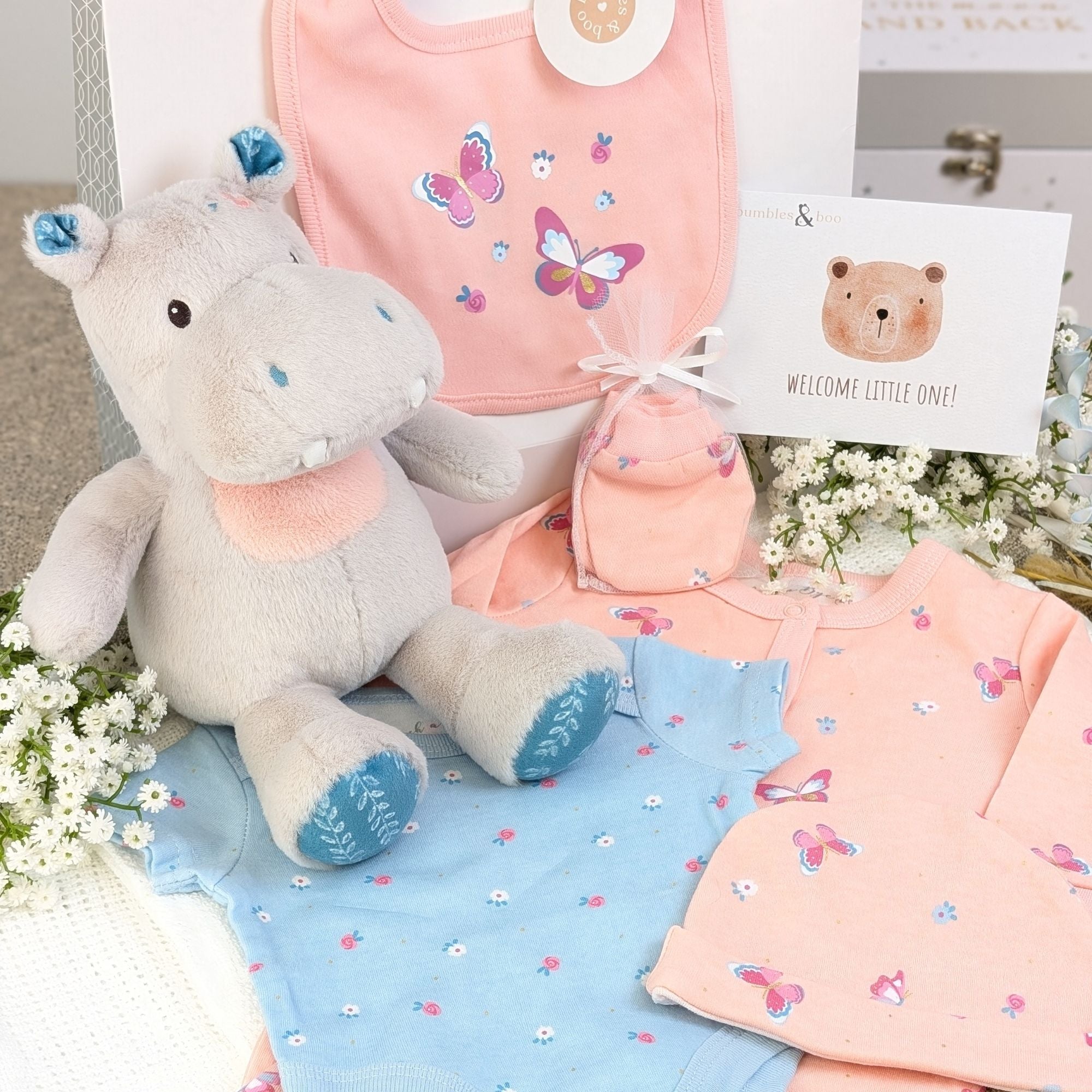 Baby girl gift bag with pink butterfly gifts clothes set and hungry hippo soft toy. Bumbles and Boo.