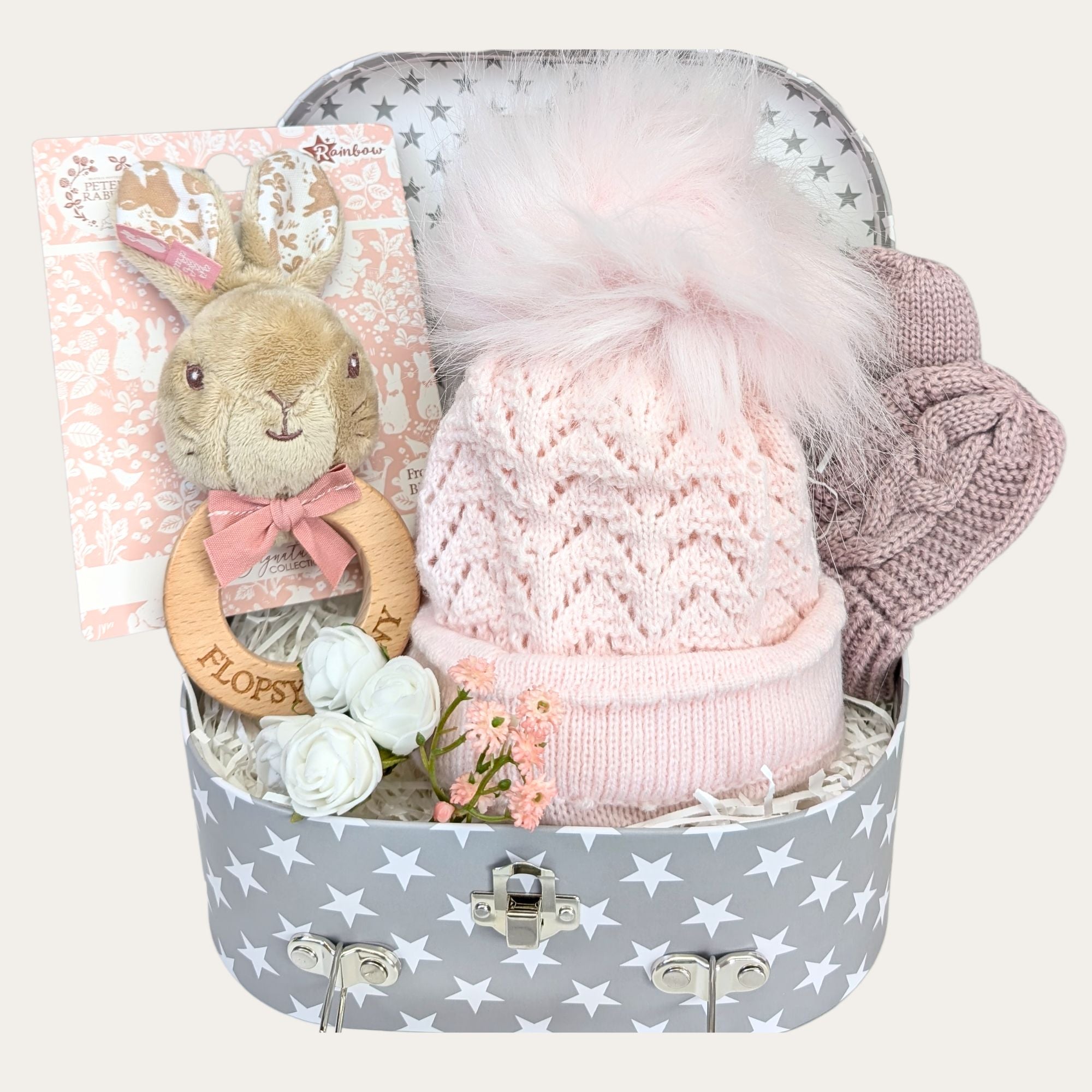 Baby girl gifts hamper with a flopsy bunny rattle and knit hat. Bumbles and Boo.