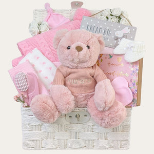 Personalised baby girl gift hamper filled with thoughtful newborn gifts – a perfect present for celebrating a new arrival.