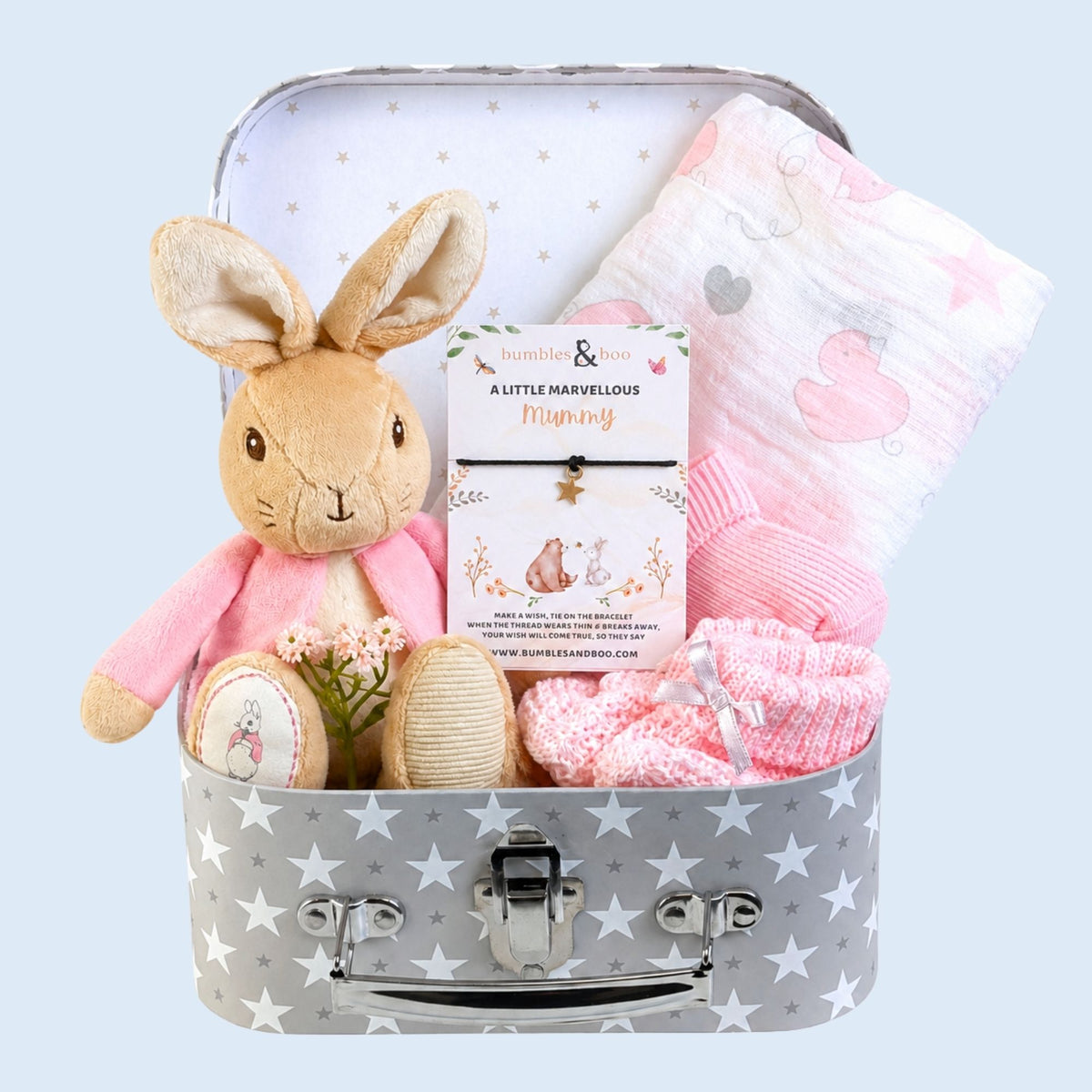 Baby girl gifts hamper with muslin square bunny soft toy baby booties baby socks and gift for mum.
