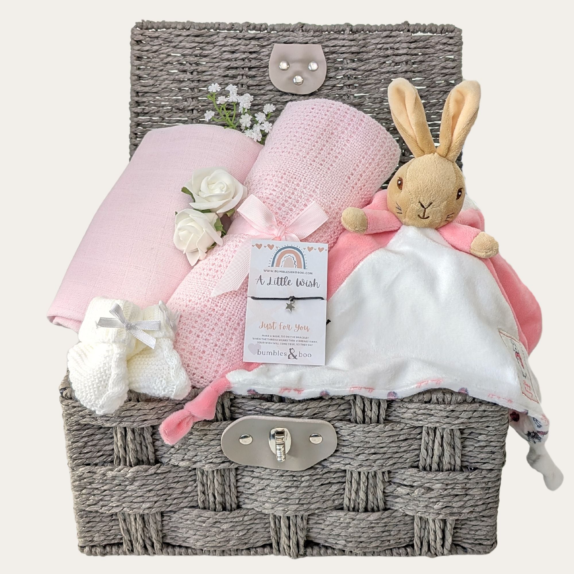 Baby girl gifts hamper basket with bunny comforter and pink cellular blanket. Bumbles and Boo.