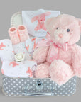 Stunning new baby girl gift hamper. Presented in a luggage suitcase trunk with gift wrapping. Includes large pink teddy bear and pink bunny clothing set.