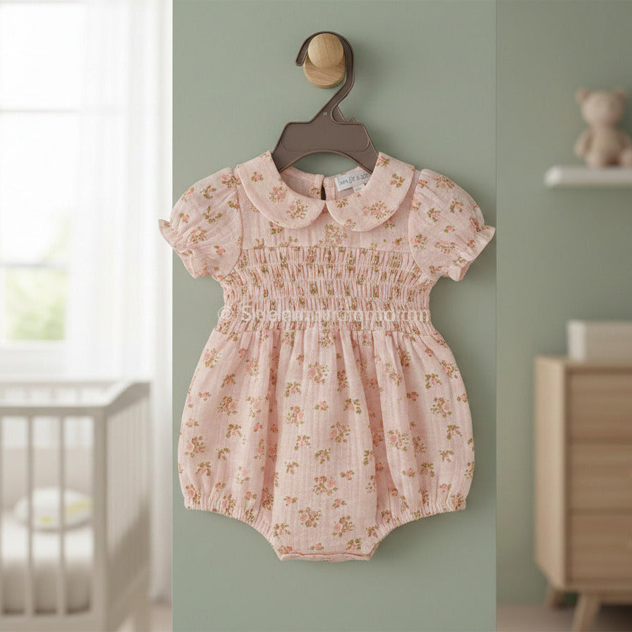 Baby girl roses romper with pink floral print and short sleeves, lightweight baby clothes outfit with gathered bodice detail.