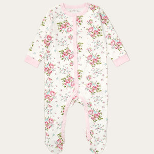 Baby girl sleepsuit with a floral pattern, this onesie is white with pink roses and green leaves