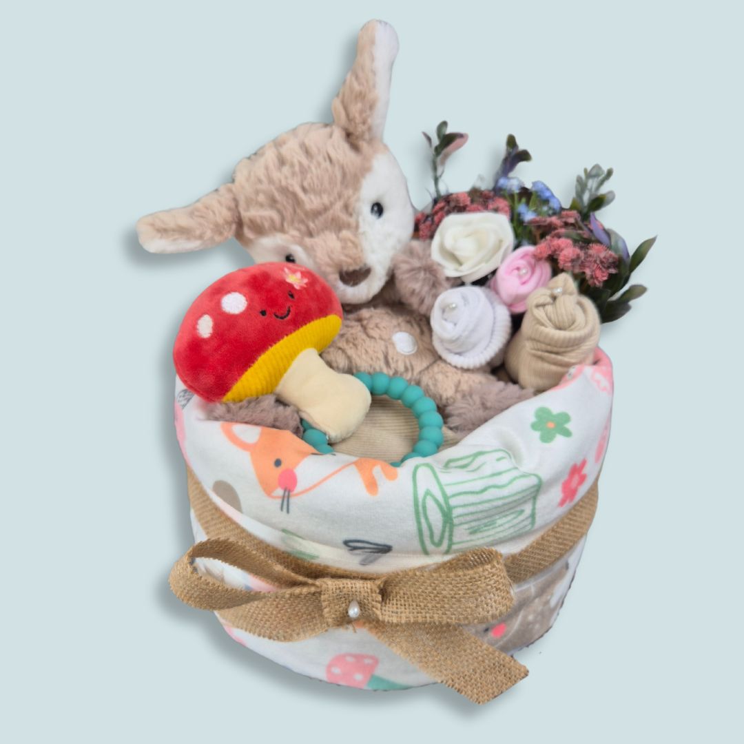 Baby nappy cake, woodland theme. Includes nappies, soft toy and teether. 