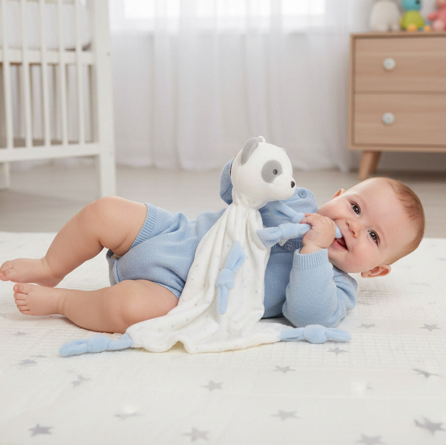 Baby panda comforter rattle in blue with soft fabric body and knotted corners, plush panda baby toy suitable from birth.