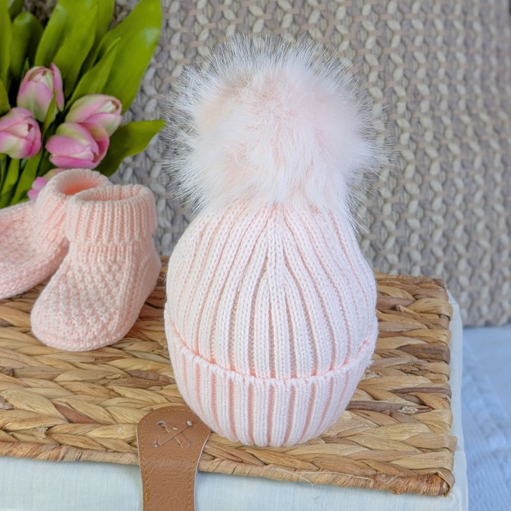 Pink knit pompom hat