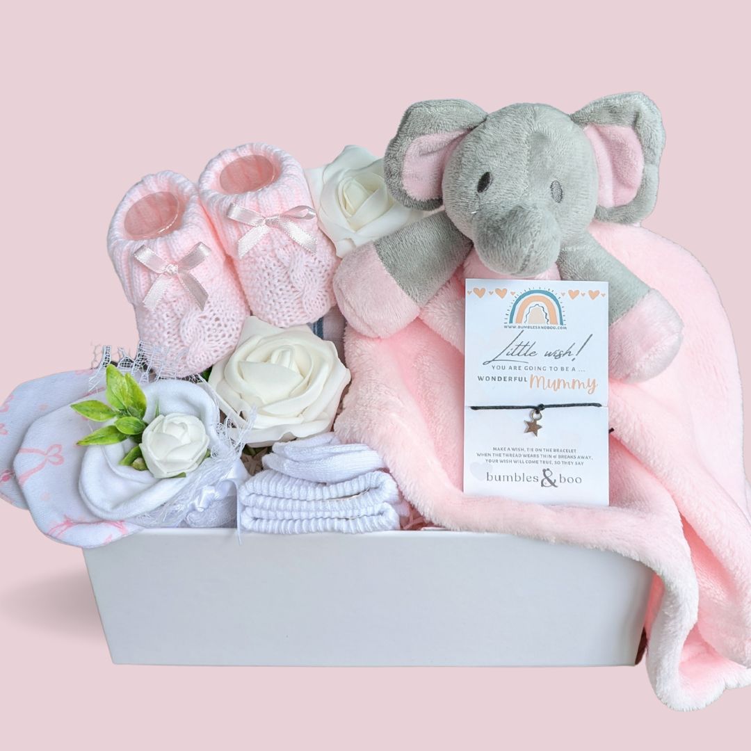 baby shower gifts box with pink elephant, baby booties, socks, mittens and bracelet for mummy.