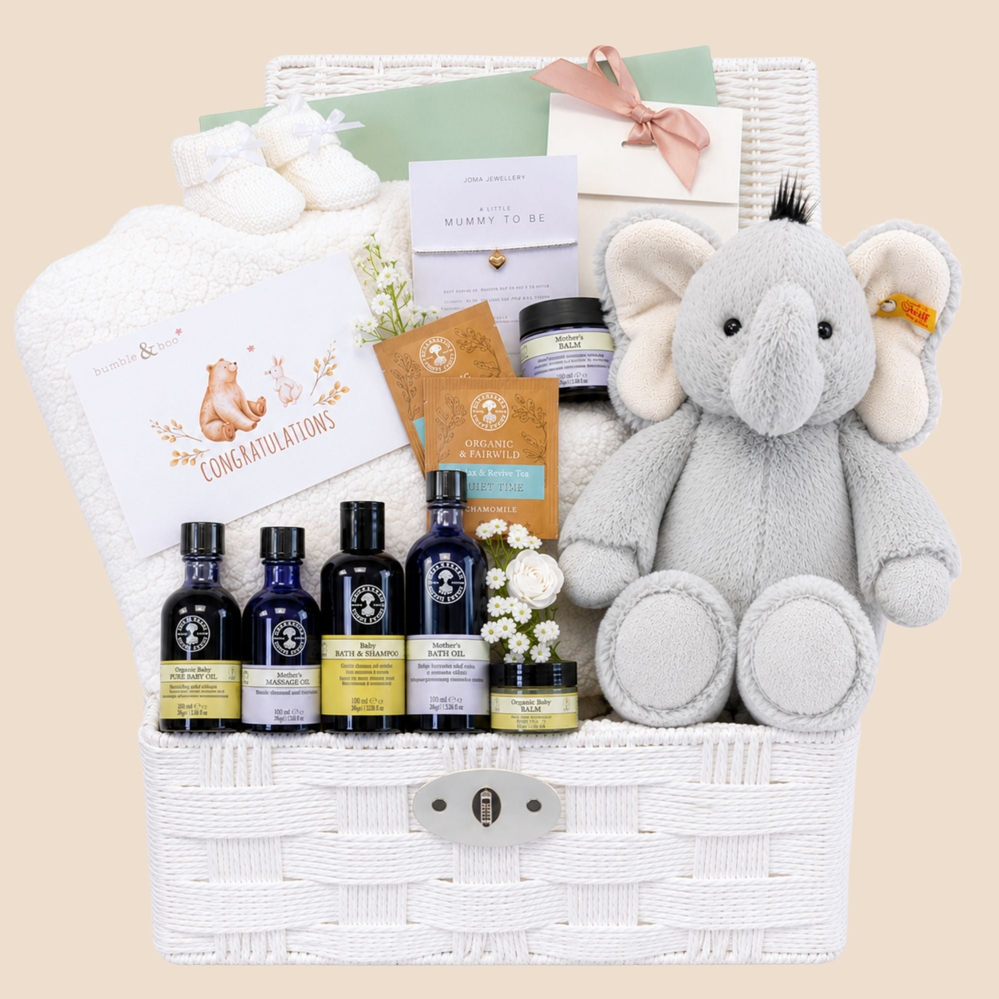 Luxury baby shower pamper hamper with gifts including Neals Yard mum and baby skincare and panda soft toy. Designed by Bumbles and Boo