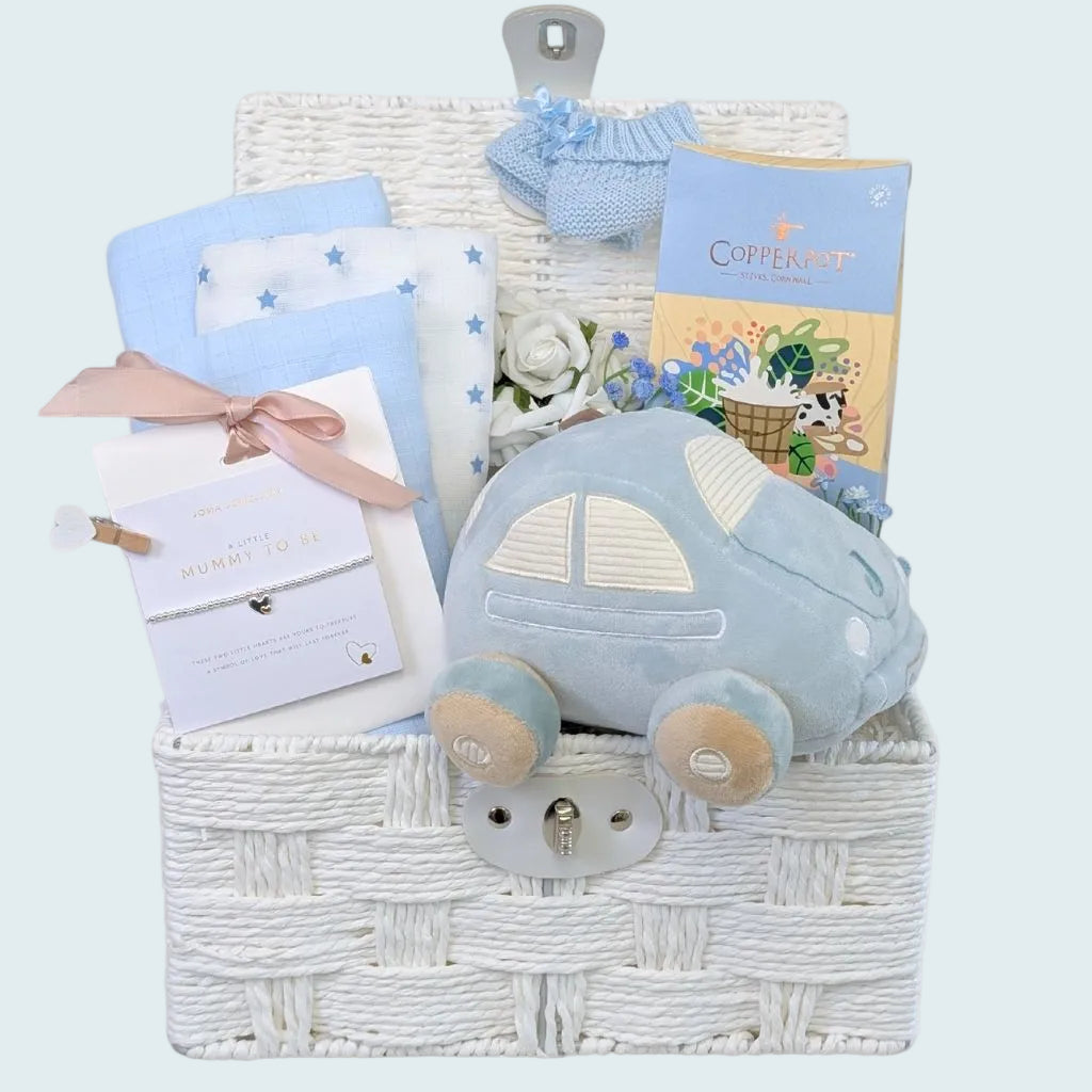 Baby Shower Gift Hamper Basket with Joma Jewellery and car theme in blue and white. Lots of essential baby presents, treats and gifts. Bumbles and Boo.
