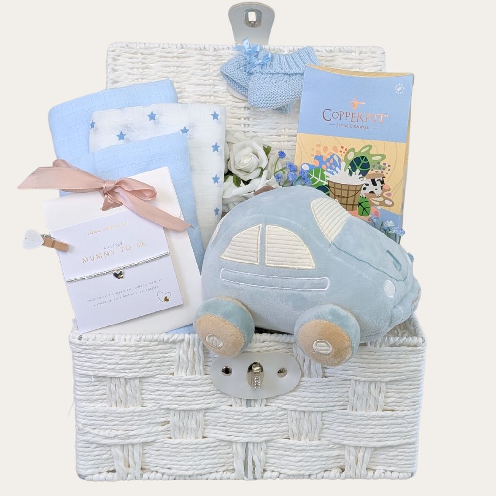 Baby Shower Gift Hamper Basket with Joma Jewellery and car theme in blue and white. Lots of essential baby presents, treats and gifts. Bumbles and Boo.