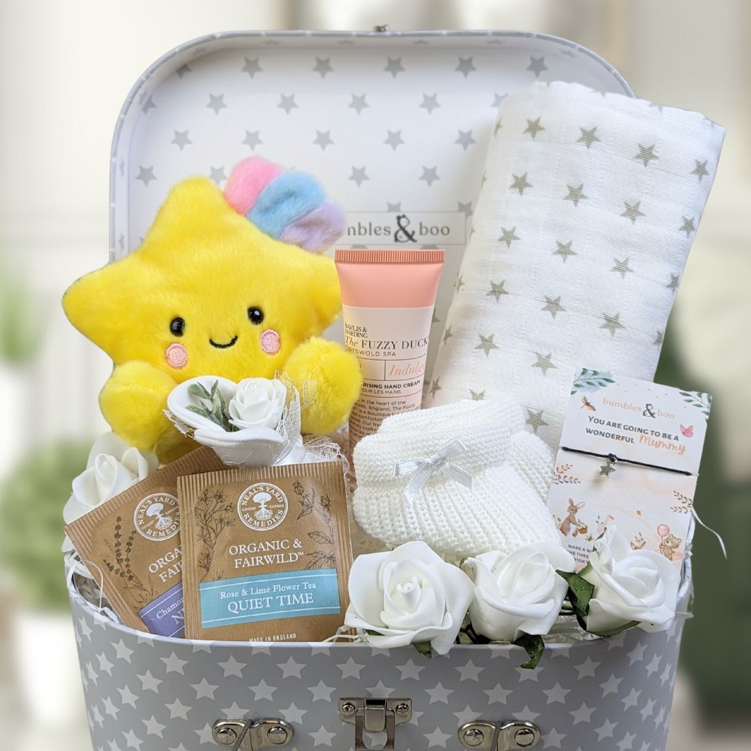 baby shower hamper with gifts for mum and baby.