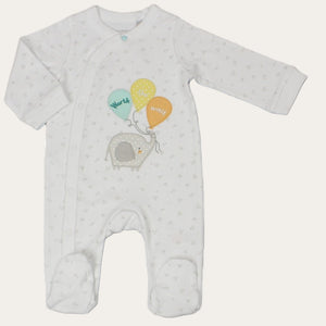 White cotton baby sleepsuit with Worth the Wait print