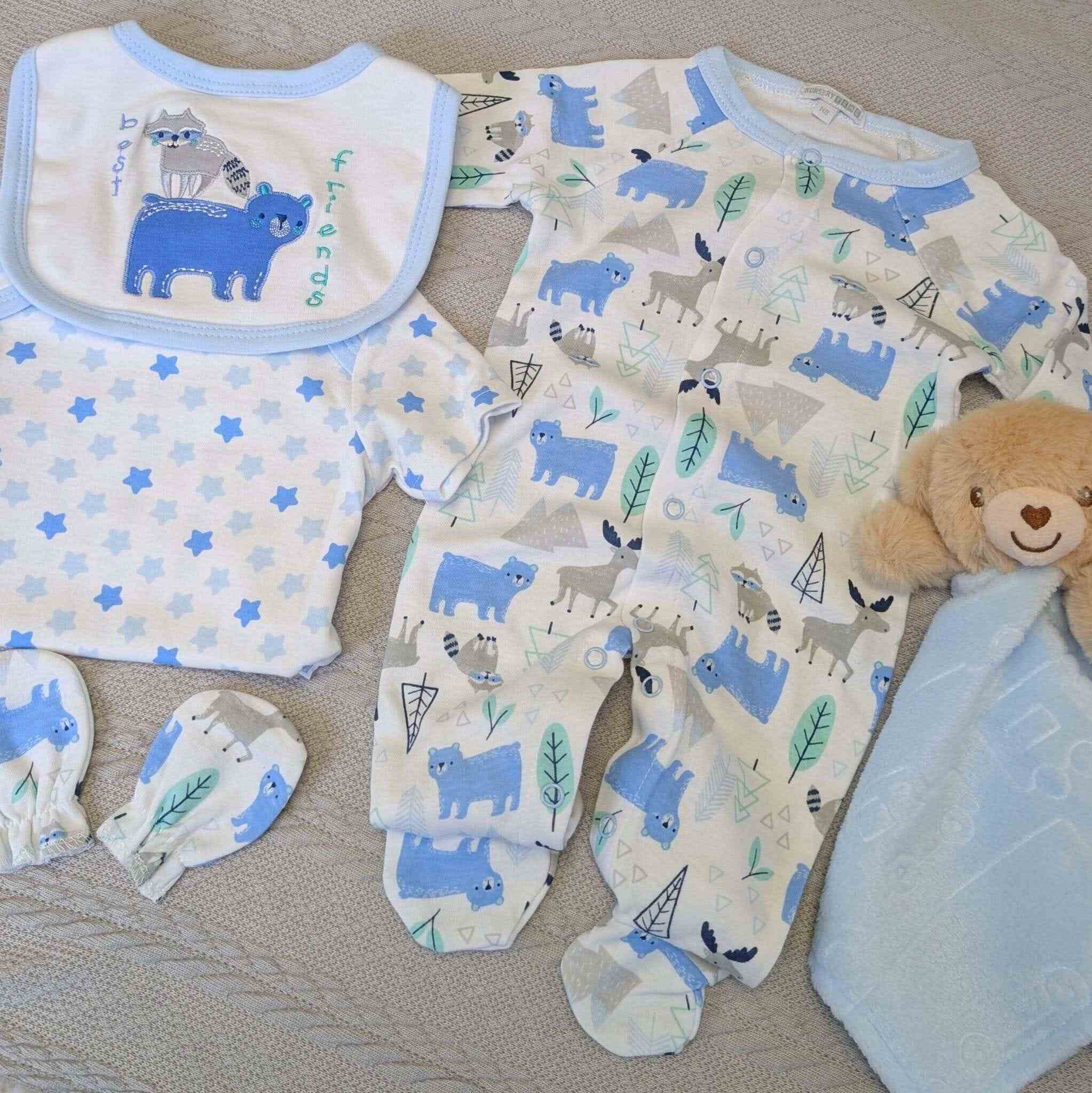 Baby boy clothing gift set in blue and white with a bear