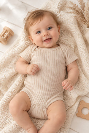 Biscuit beige 100% cotton ribbed baby bodysuit detail