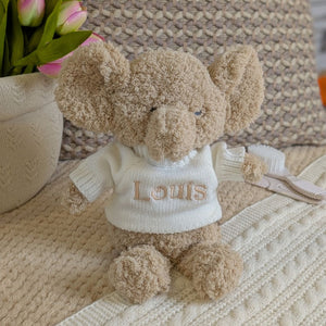biscuit coloured elephant which can be personalised with a jumper ands embroidery.