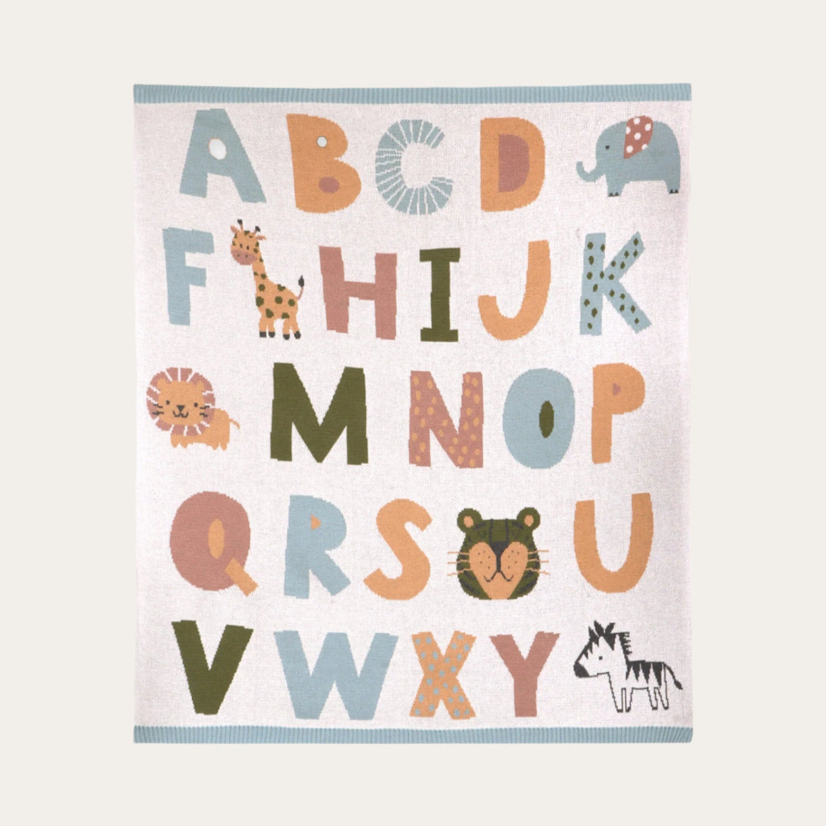 Folded mint and cream alphabet baby blanket made from organic cotton