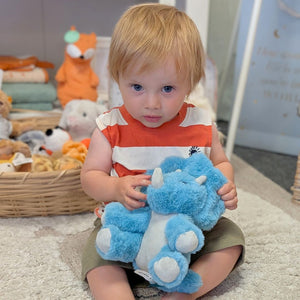 A blue dinosaur soft toy made from recycled materials