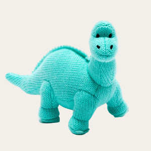 Knitted diplodocus baby rattle in ice blue.