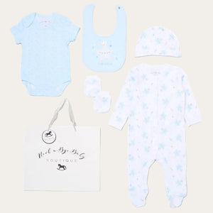 Baby clothing set with onesie, bib, hat, and romper on a white background with little prince and a star
