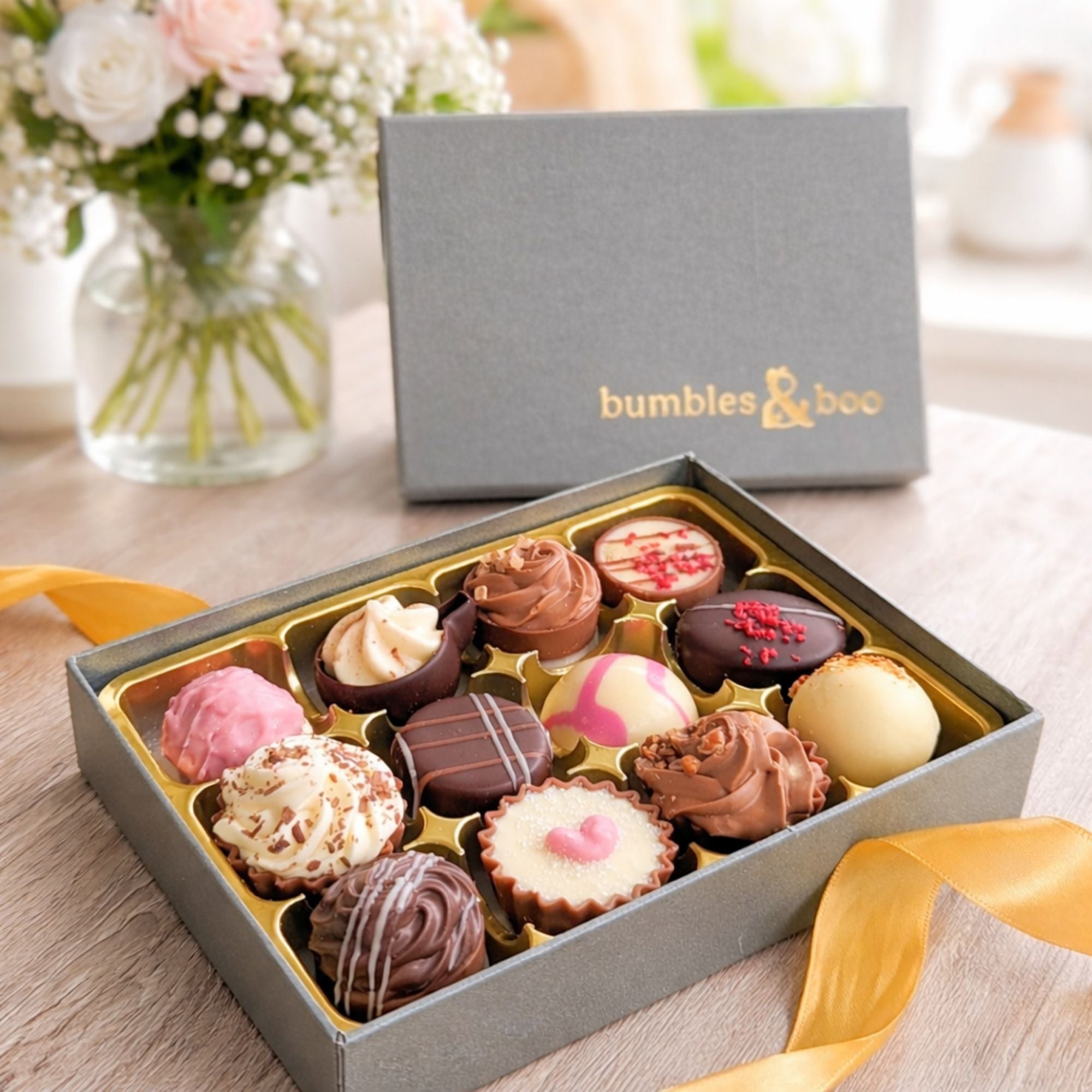 Milk chocolates truffle selection of chocolates in a box with bumbles and boo branding