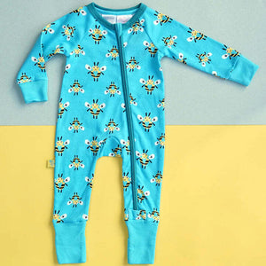 Close-up of zip on Buzzy Bee baby sleepsuit