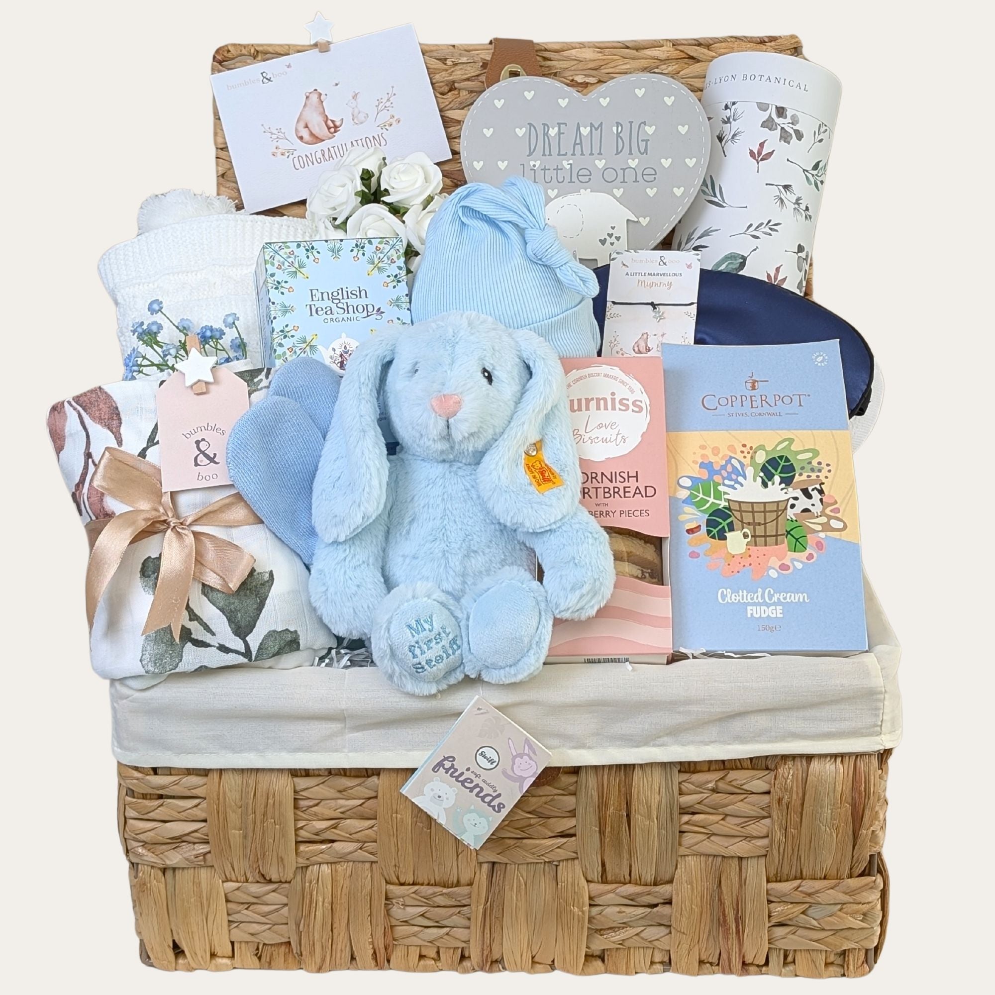 New mum gifts hamper basket with many presents for a new mum and a bunny soft toy.