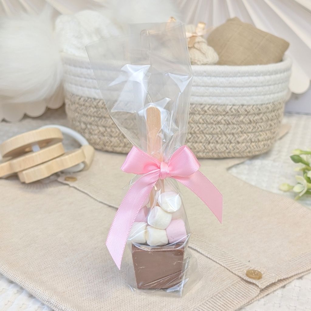 Marshmallow and chocolate treat in a clear wrapper with a pink bow.