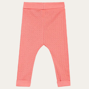 Coral textured baby leggings on a white background