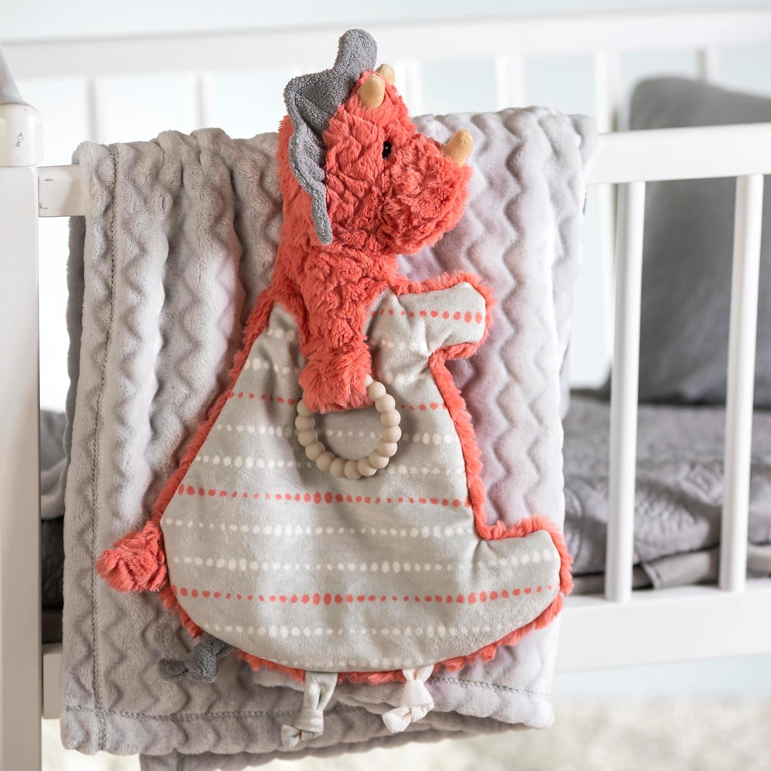 Dino Baby Comforter – soft rust lovey with teether ring